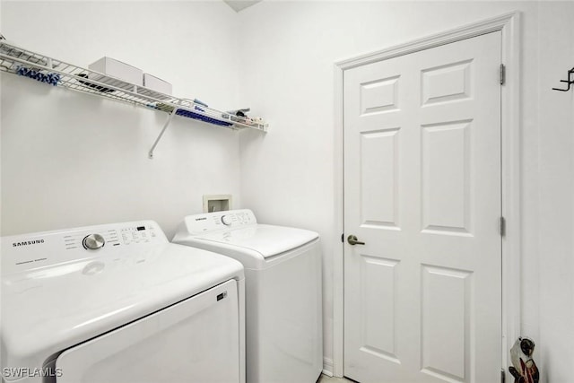 18911 Bay Woods Lake Dr Unit 101, Fort Myers, FL 33908 - clothes washing area featuring washer and dryer and laundry area