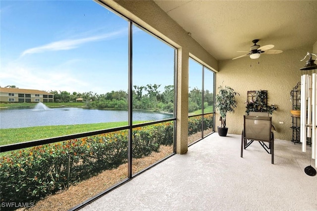 18911 Bay Woods Lake Dr Unit 101, Fort Myers, FL 33908 - sunroom / solarium with ceiling fan, a textured wall, and a water view