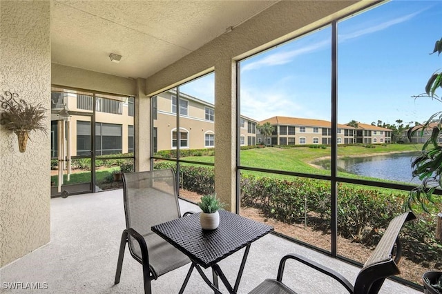 18911 Bay Woods Lake Dr Unit 101, Fort Myers, FL 33908 - sunroom with a water view