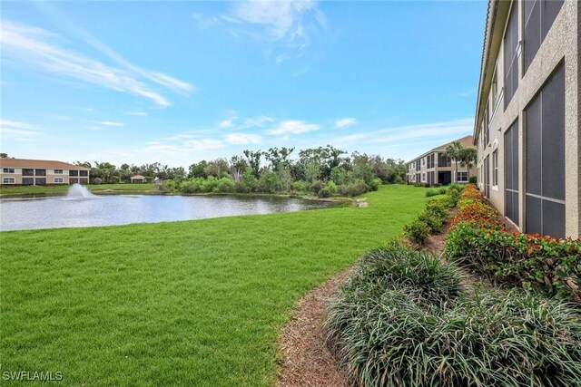 view of yard with a water view