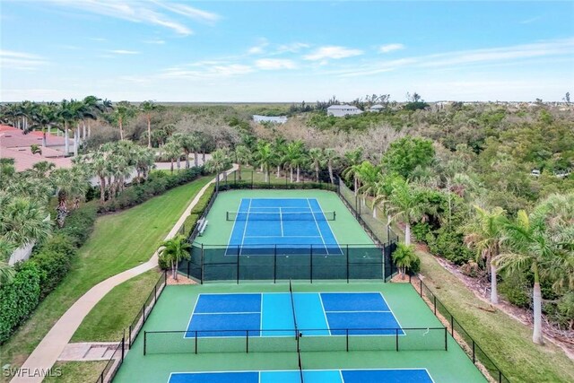 view of sport court with fence