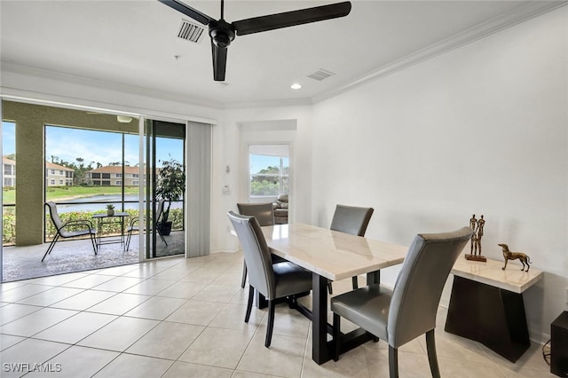 18911 Bay Woods Lake Dr Unit 101, Fort Myers, FL 33908 - dining room featuring crown molding, light tile patterned flooring, and visible vents