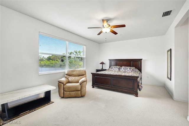 18911 Bay Woods Lake Dr Unit 101, Fort Myers, FL 33908 - bedroom featuring visible vents, a ceiling fan, baseboards, and light carpet
