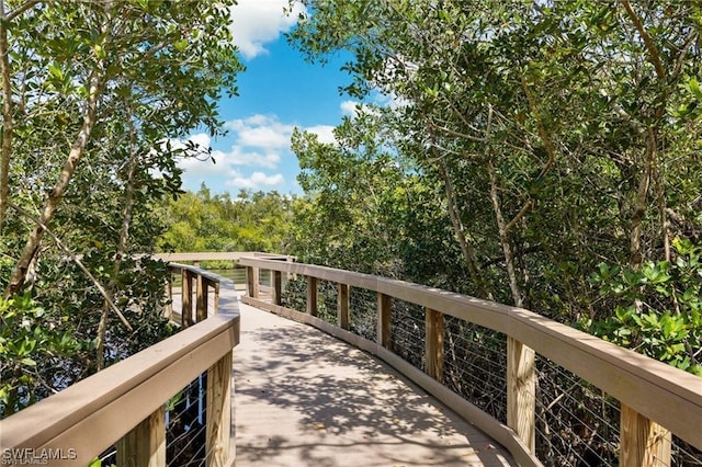 18911 Bay Woods Lake Dr Unit 101, Fort Myers, FL 33908 - view of home's community with a wooden deck