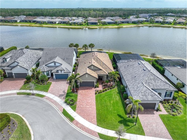 aerial view with a water view and a residential view