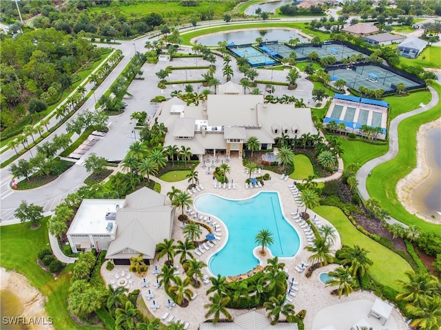 birds eye view of property featuring a water view