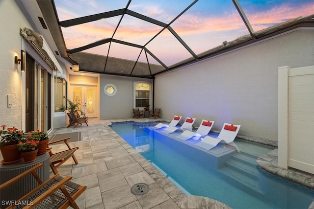 pool featuring a patio and a lanai