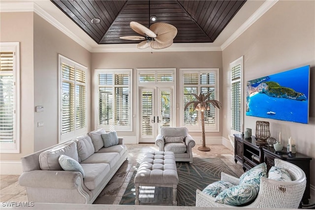 living room with wood ceiling, plenty of natural light, and crown molding