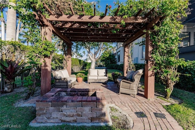 view of patio with outdoor lounge area and a pergola