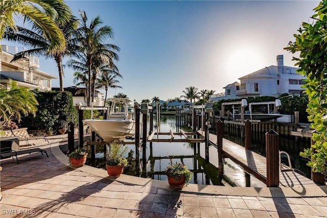 view of dock featuring a water view and boat lift