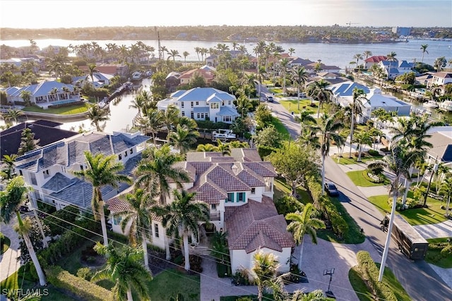 aerial view featuring a residential view and a water view