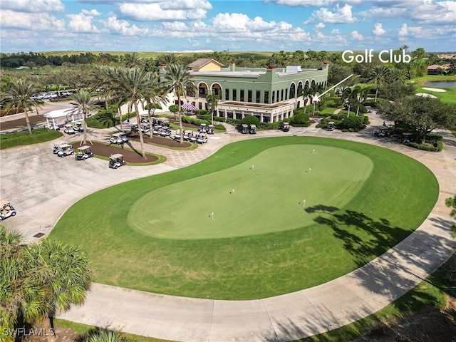 birds eye view of property with golf course view