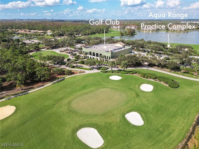 aerial view featuring view of golf course and a water view