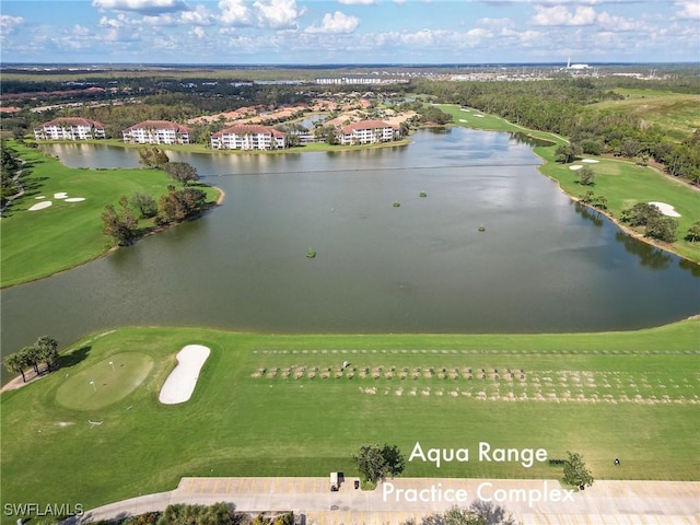 aerial view featuring a water view and golf course view