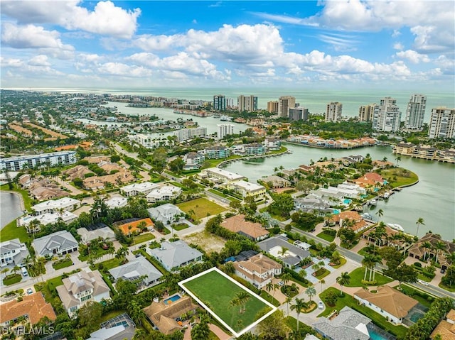 aerial view featuring a water view and a city view