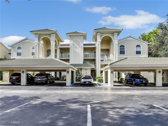 view of property with covered parking