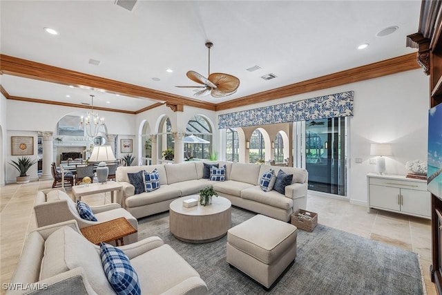 living area featuring light tile patterned floors, recessed lighting, ceiling fan with notable chandelier, a fireplace, and crown molding