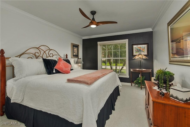 bedroom featuring ornamental molding, light carpet, ceiling fan, and baseboards