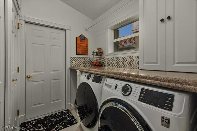 laundry room with independent washer and dryer