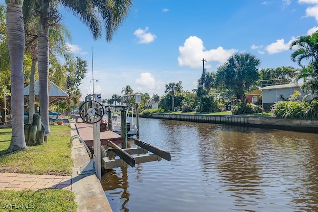 dock area featuring a water view and boat lift