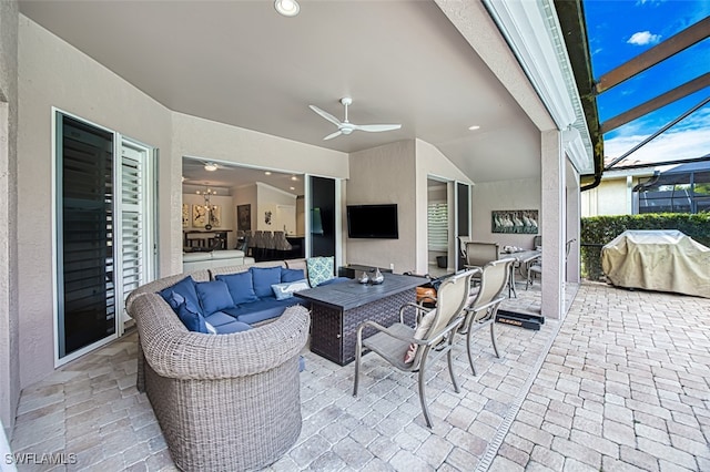 view of patio with ceiling fan, glass enclosure, outdoor lounge area, grilling area, and outdoor dining space