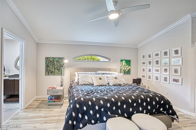 bedroom featuring a ceiling fan, crown molding, baseboards, and wood finished floors