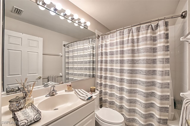 full bathroom featuring shower / bathtub combination with curtain, visible vents, vanity, and toilet