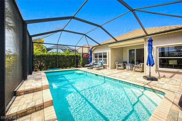 view of pool featuring a patio and a fenced in pool