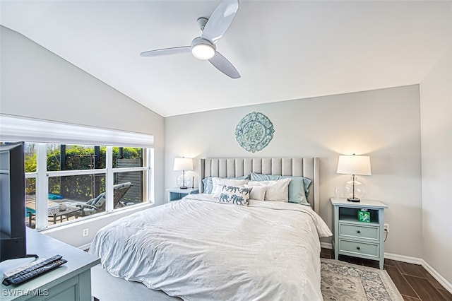 bedroom featuring wood tiled floor, ceiling fan, lofted ceiling, and baseboards