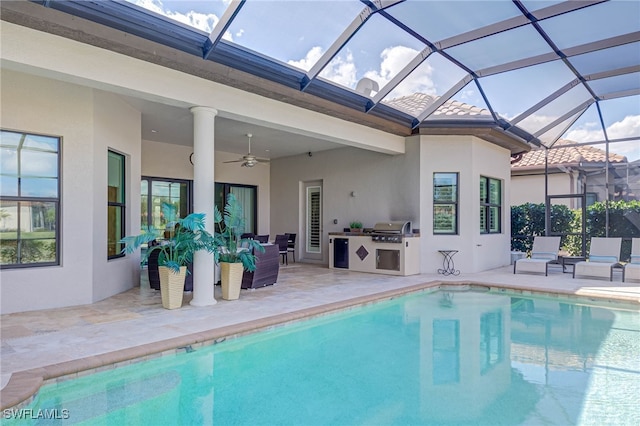 pool featuring a patio area, area for grilling, a lanai, and a ceiling fan