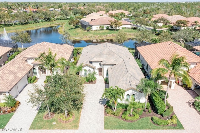 bird's eye view with a water view and a residential view