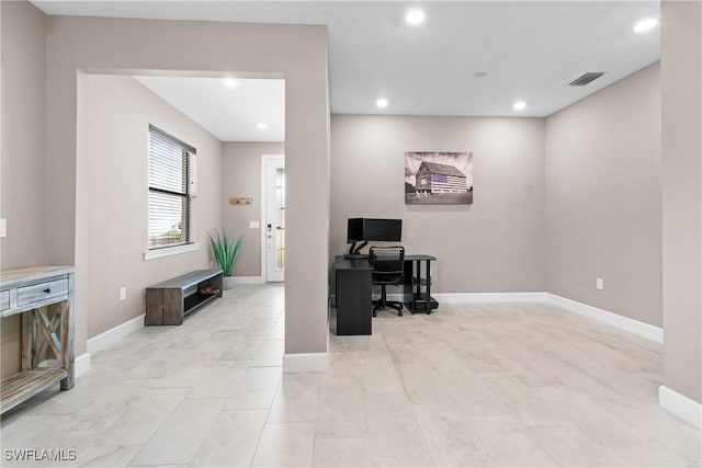 office featuring recessed lighting, visible vents, and baseboards