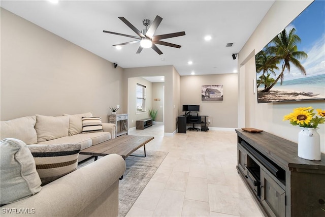 living room with recessed lighting, visible vents, ceiling fan, and baseboards