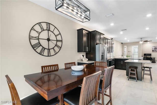 dining space featuring wine cooler, visible vents, a ceiling fan, and recessed lighting