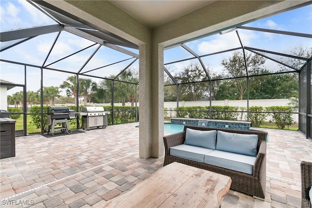 view of patio / terrace with outdoor lounge area, glass enclosure, an outdoor pool, and grilling area