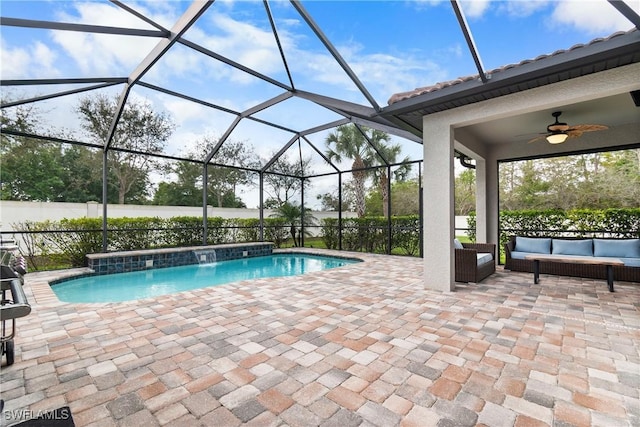 view of swimming pool featuring a lanai, ceiling fan, an outdoor hangout area, and a patio