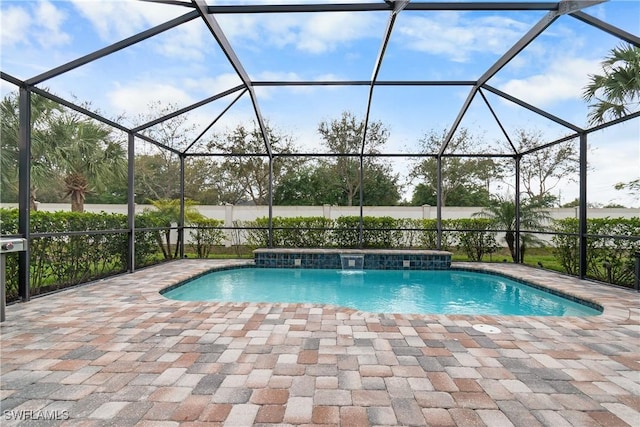 pool featuring a patio area and a lanai