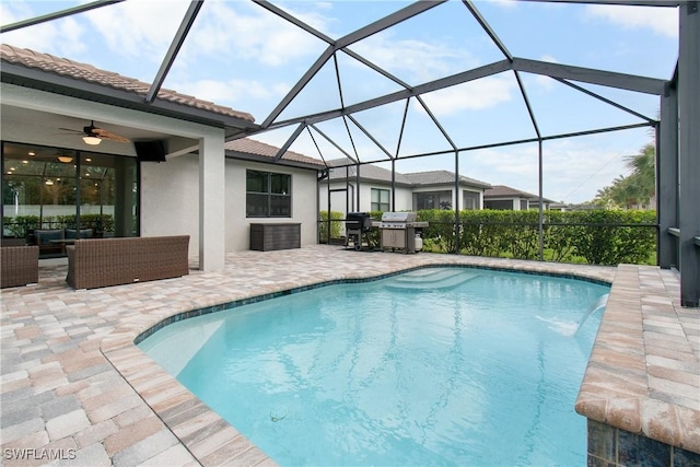 outdoor pool featuring a ceiling fan, a patio area, a grill, and an outdoor living space