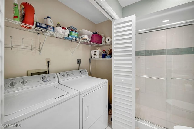 laundry area featuring laundry area and washer and dryer