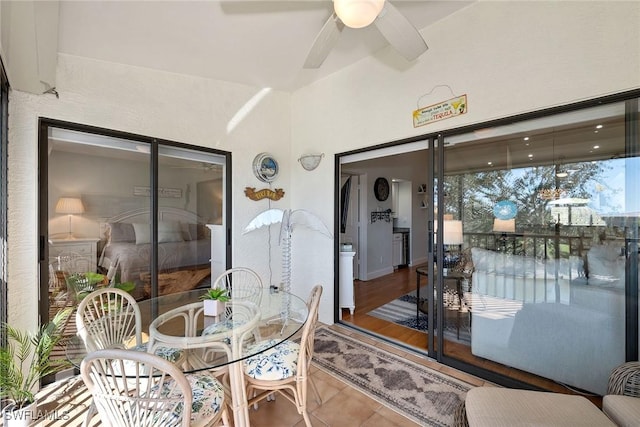 interior space featuring ceiling fan