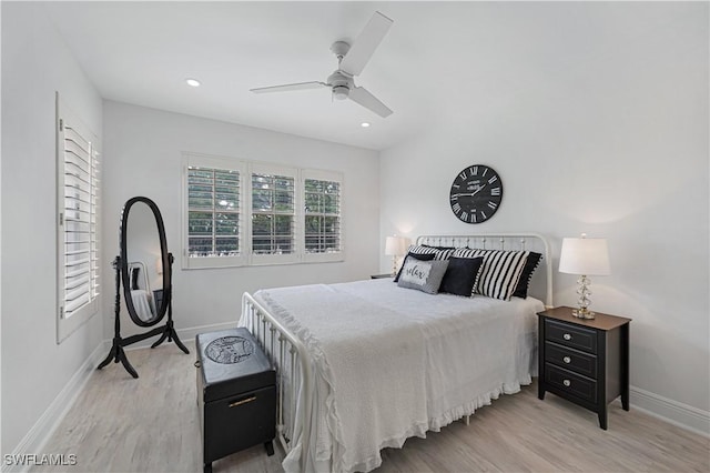 bedroom with light wood finished floors, baseboards, a ceiling fan, and recessed lighting