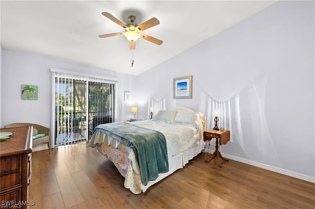 bedroom with a ceiling fan, access to outside, baseboards, and wood finished floors