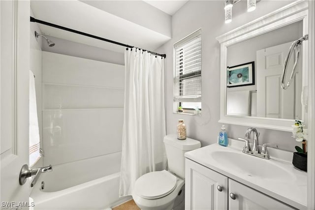 full bathroom with toilet, shower / tub combo with curtain, and vanity