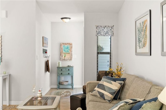 interior space featuring tile patterned floors and baseboards