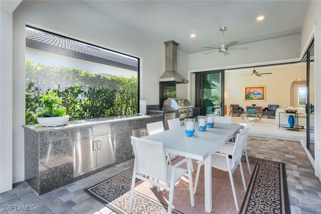 view of patio / terrace with outdoor dining area, outdoor lounge area, area for grilling, a grill, and a ceiling fan