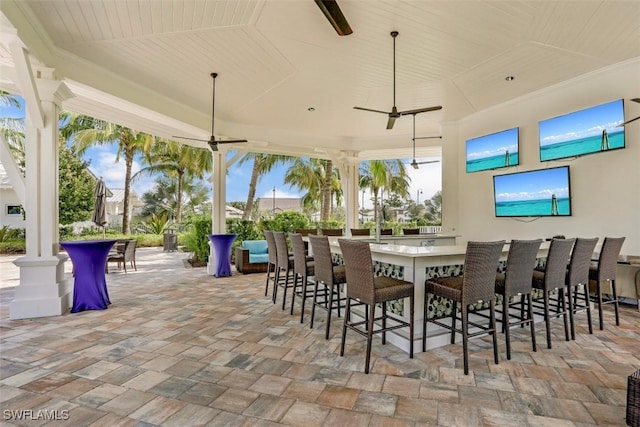 view of patio / terrace featuring an outdoor bar