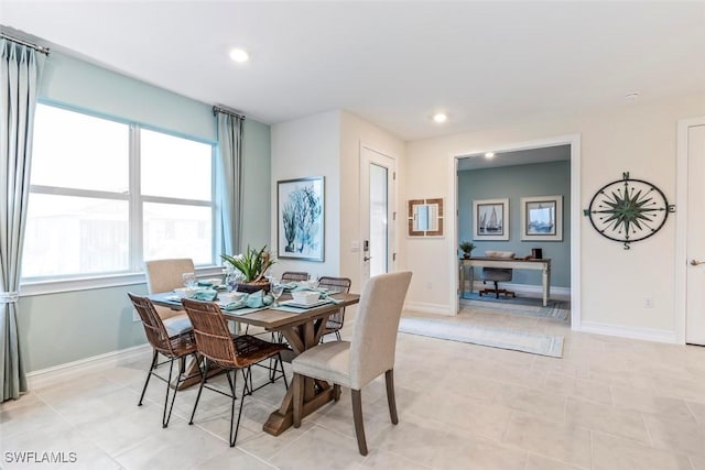 dining area featuring recessed lighting and baseboards