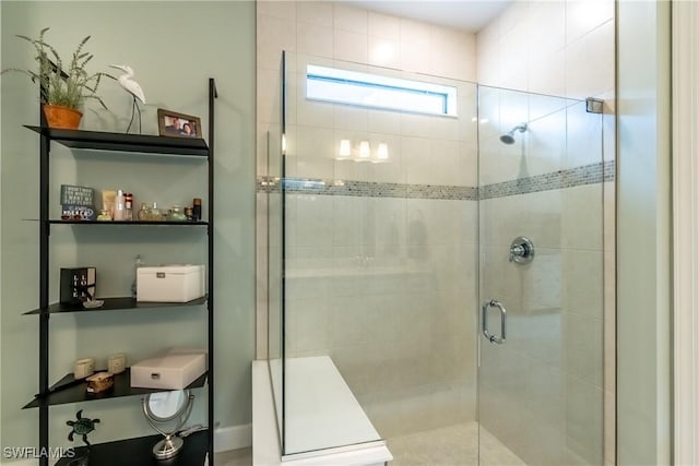 bathroom featuring a shower stall