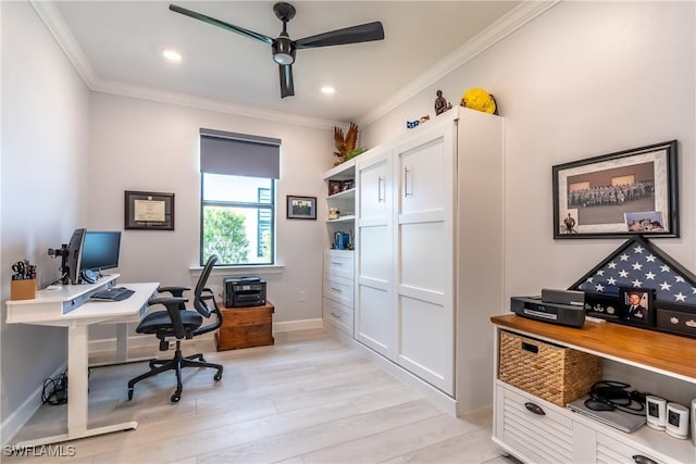 office featuring light wood finished floors, ceiling fan, baseboards, and crown molding