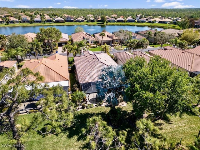 aerial view with a water view and a residential view